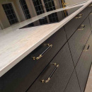 Handgreep Brohult M - 128mm - Gepolijst Messing/Zwart